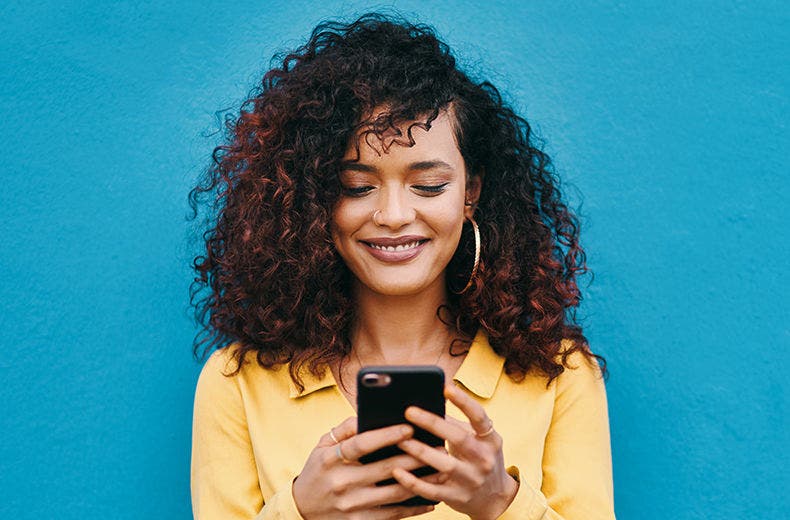 Lady on the CreditView app smiling 