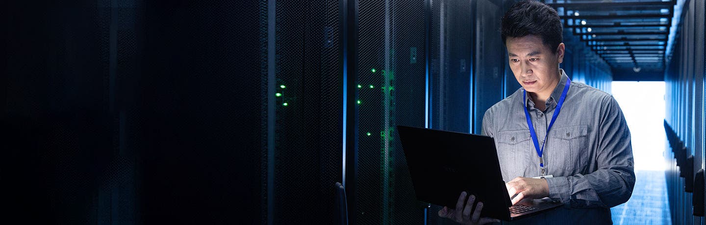 business man looking at laptop