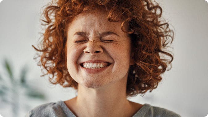 A picture of a happy consumer using Open Banking